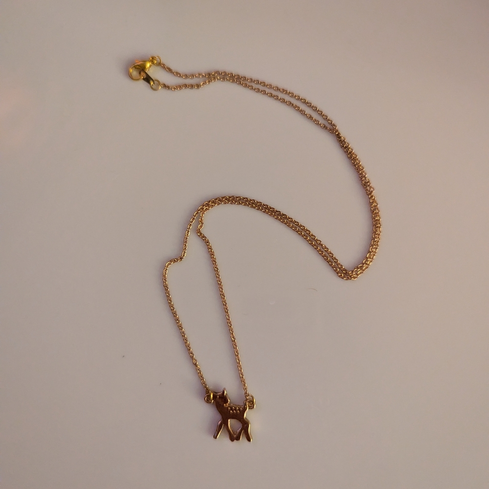 Elegant Gold Necklace with Doe Pendant